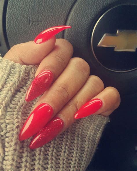 red ferrari and red glitter stiletto nails nailsss