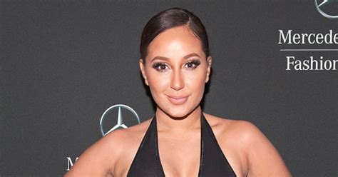 adrienne bailon flaunts 2 pierced nipples major cleavage see the pic