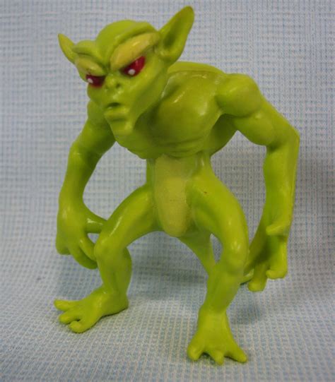 blackstar green alien demon figure