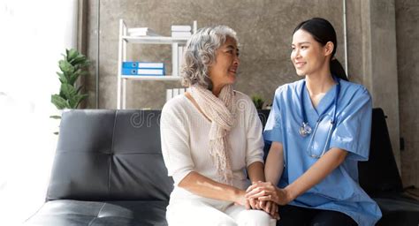 Asian Senior Female Patient Consult With Physician Nurse At Nursing