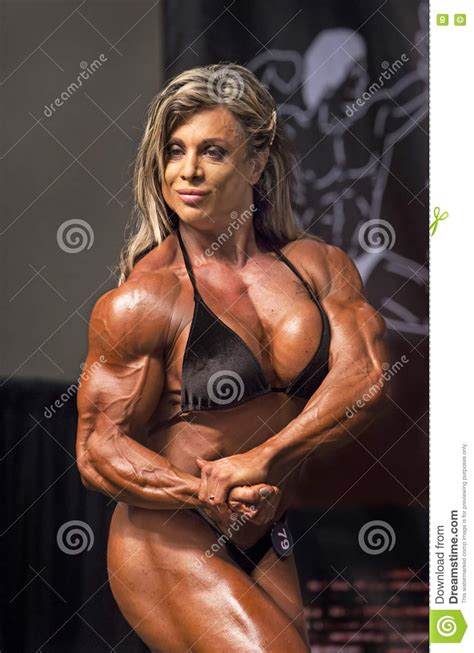 luscious muscle goddess poses on stage editorial stock