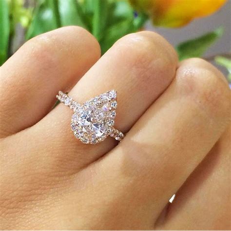 stunning pear shaped diamond engagement rings  glossychic wedding rings teardrop pear