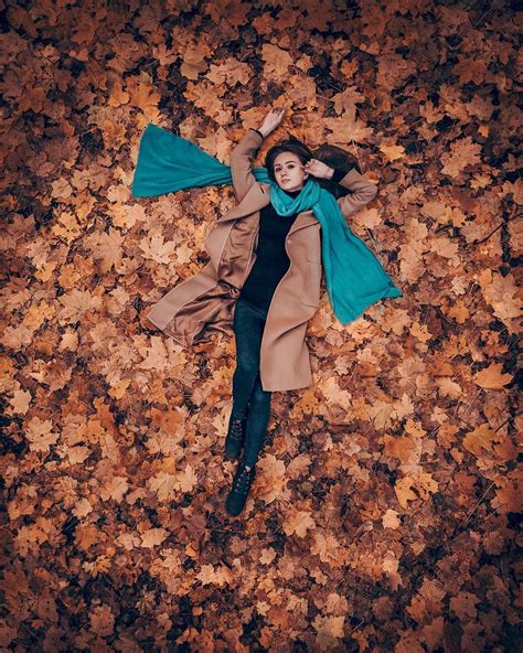 woman laying   ground  leaves