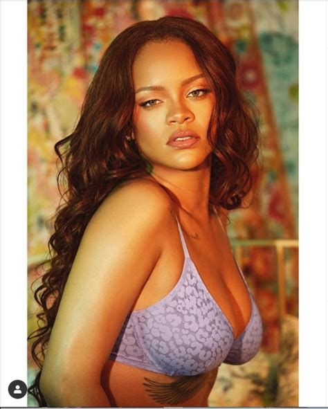 rihanna flaunts her assets as she posses in just bra pants photos bamzz