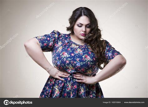 Plus Size Fashion Model In Casual Clothes Fat Woman On Beige