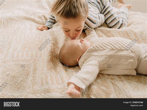 Brother Kisses His Image And Photo Free Trial Bigstock