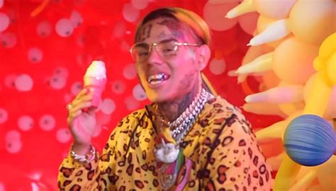 tekashi 6ix9ine accused of beating ex girlfriend forcing her to have