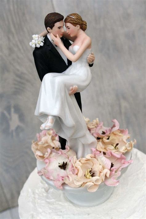 bed of roses groom holding the bride by weddingcollectibles wedding