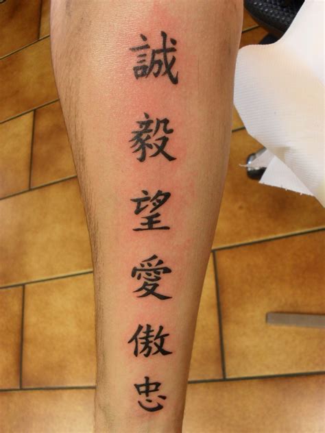 tattoo of six chinese symbols on leg tattooimages