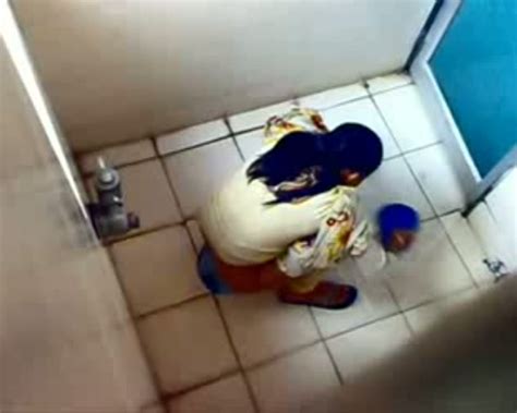 Indian Girl Pissing In The Toilet And It Takes A Hidden Camera