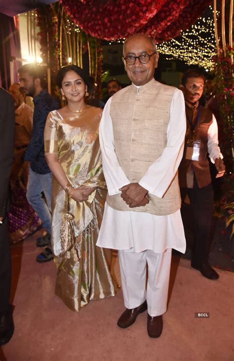 digvijaya singh poses with wife amrita rai as they attend shriya bhupal