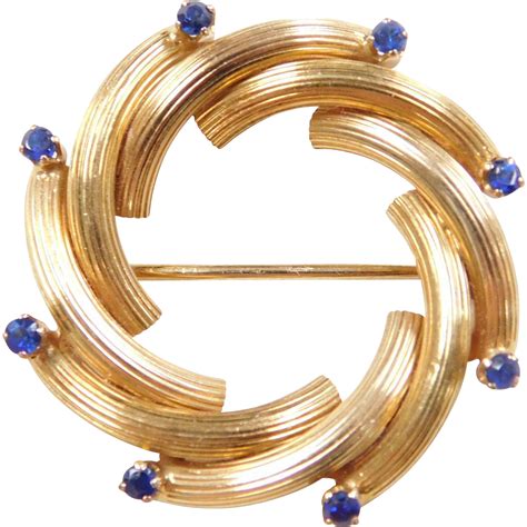 vintage 18k gold round sapphire pin brooch from arnoldjewelers on