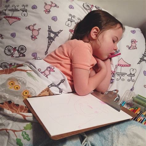 sweet 4 year old girl draws until she falls asleep