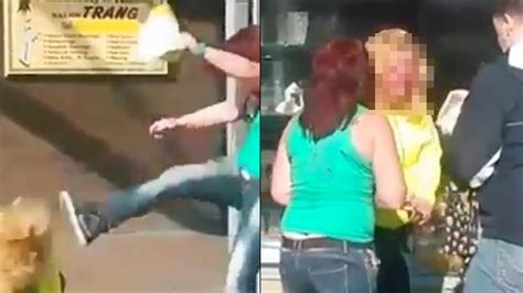 watch shocking moment woman is punched to ground in daylight town centre brawl mirror online