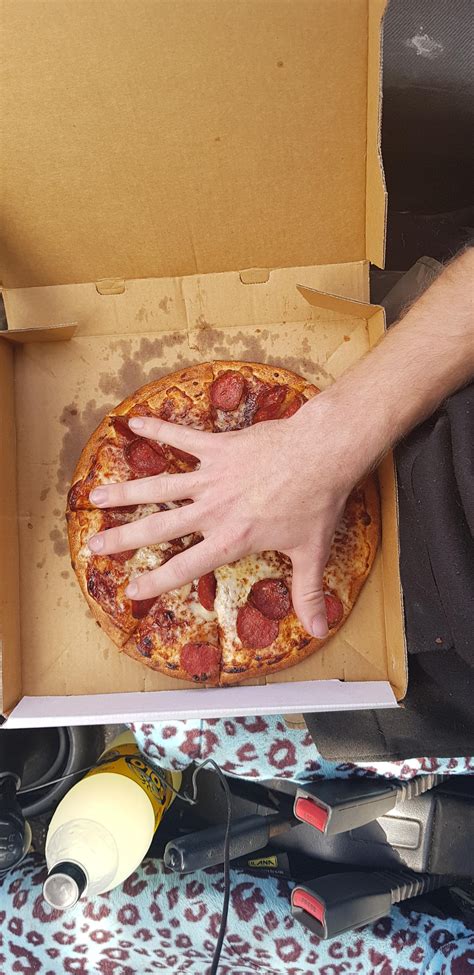 australia dominos releases     york pizzas   reduces  size  regular