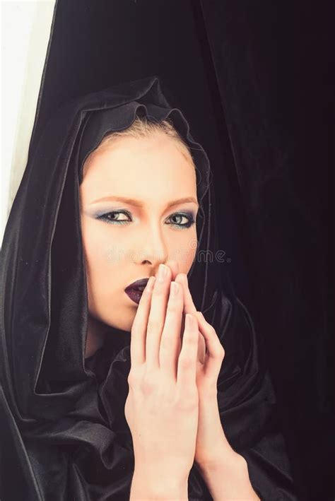 Religion And Death Concept Madonna Woman In Black Hood Makeup Look