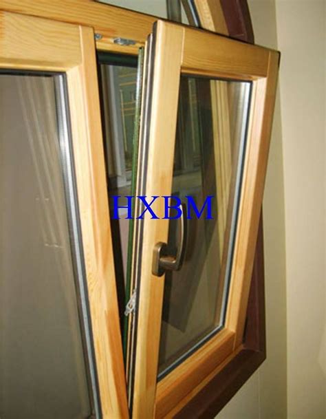 energy saving triple glazed aluminium clad wood windows  grids  uae market