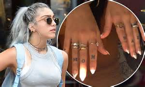 madonna s daughter lourdes shows her mom and dad finger ink daily mail online