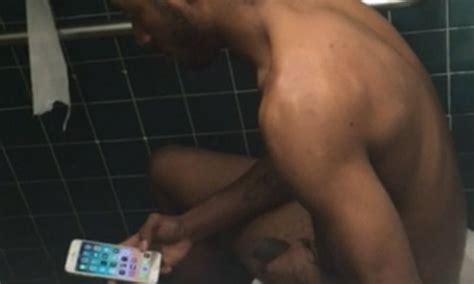 black dude stroking his big shaft in a public toilet spycamfromguys hidden cams spying on men