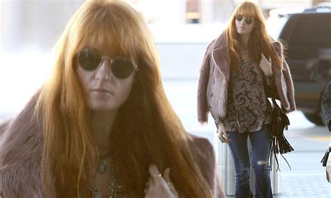 florence welch rocks a retro look as she jets out of los angeles daily mail online