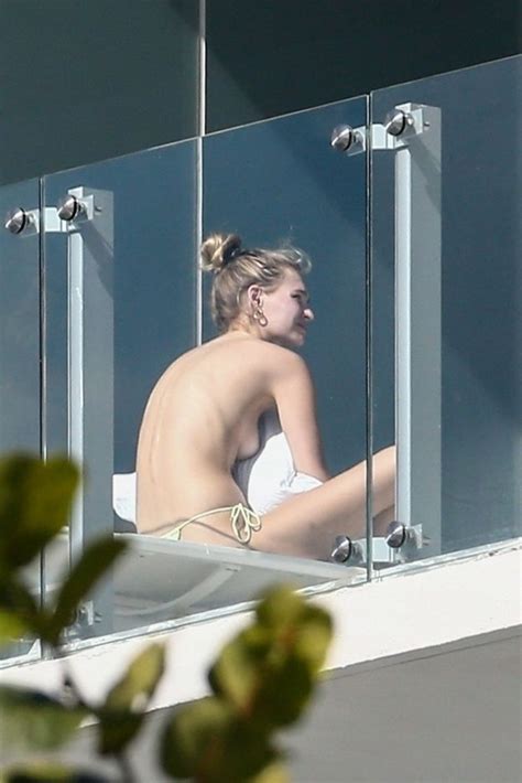 roosmarijn de kok topless sunbathing on her balcony 24