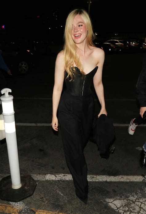 elle fanning perfectly blended  corset  baggy trousers trends