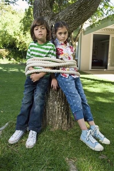 Foto Gratis Brother And Sister Tied Up Outdoors Para Descargar Freeimages