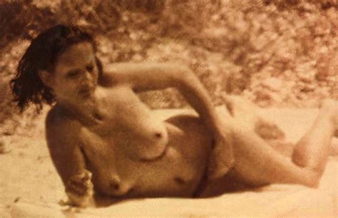 claudia cardinale shows nude boobs and sexy body on the beach