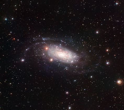 beautiful spiral galaxy  oddly flat center wired