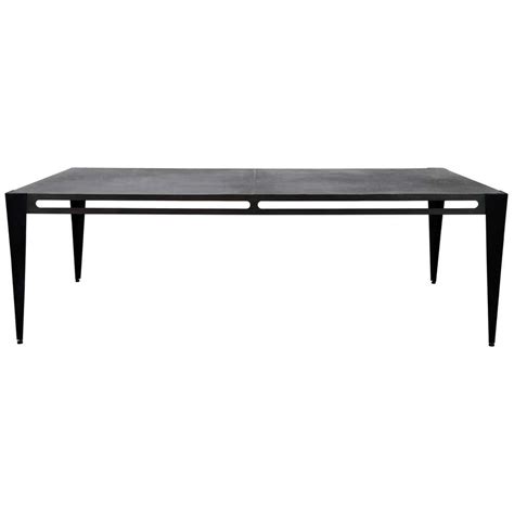 showroom sample sale icon table in steel and leather by christopher