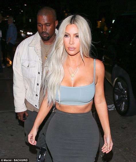 kim kardashian flaunts curves in crop top and skintight skirt as she heads to kendall jenner s