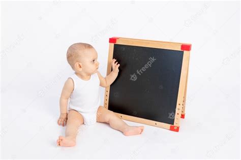 premium photo  child draws   blackboard  chalk   white