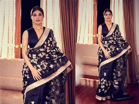 Jacqueline Fernandez S Black Sari With Golden Jewellery Is