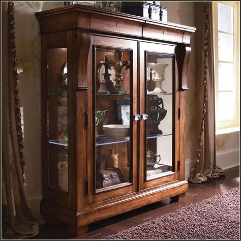 discovering  beauty  wall curio cabinet glass doors home cabinets