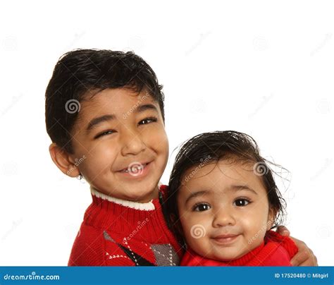 smiling siblings brother holding baby sister stock photo image