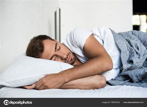 man sleeping  bed stock photo  callaserebrina