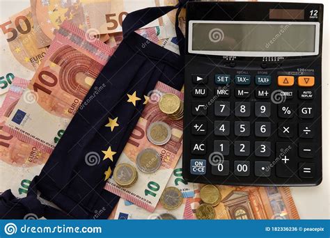 close    calculator euro bills  diy facemask designed   european union flag stock