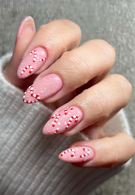 festive fingertips  enchanting christmas nail ideas candy cane pink