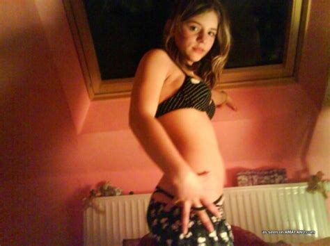 blonde amateur kinky teen posing topless in the bedroom pichunter