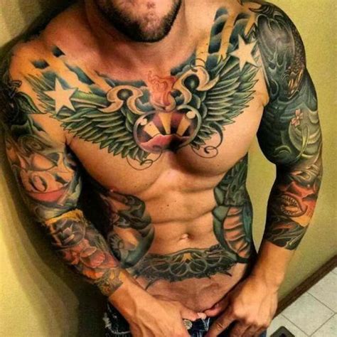 An Image Of A Man With Tattoos On His Chest