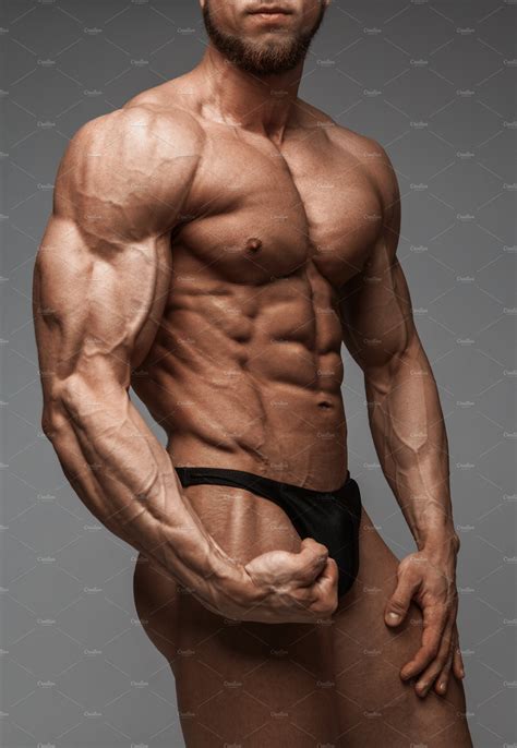 bodybuilder man  perfect abs  muscle bodybuilder