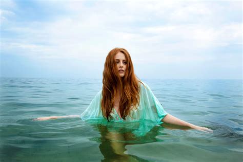 a photographer is documenting beautiful redheads around the world