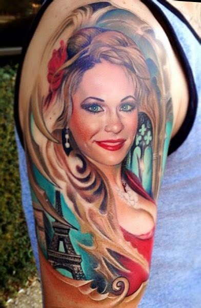 Realistic Looking Colored Shoulder Tattoo Of Sexy Woman With Eiffel