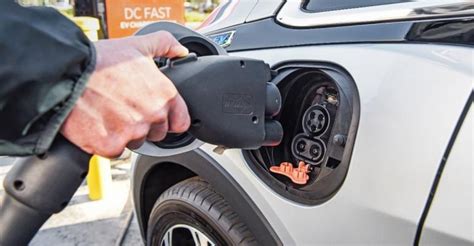gm  tap dealer network  install  ev chargers wardsauto