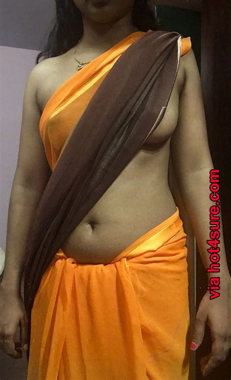 no bra desi bhabhi sexy photoshoot in yellow saree hot4sure