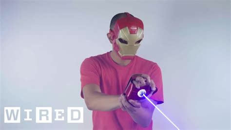 wired tests  real life iron man glove  shoots  blue  laser