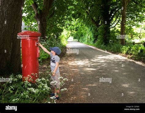 child posting  letter   country lane stock photo alamy