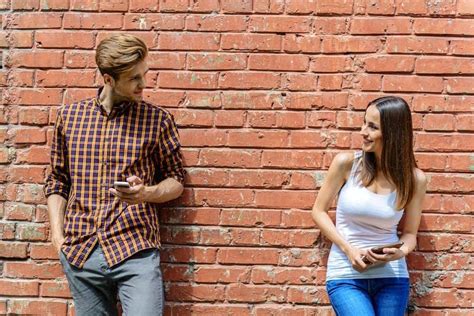 how to tell if a guy is flirting with you 7 signs to watch out for