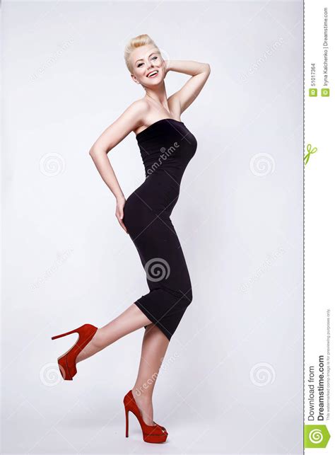 Beauty Blond Woman In Skinny Black Dress Pinup Perfect