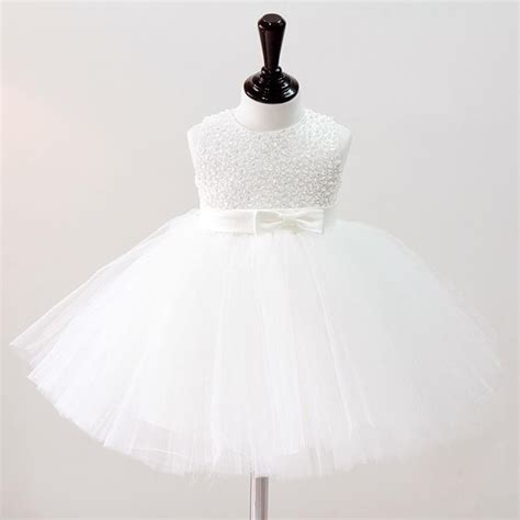 a line princess knee length white satin flower girl dress with sequins